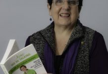 Phillipa laughing with health book