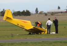 Investigators examine plane death crash site