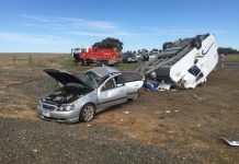 Tourists’ caravan flips at Inverleigh
