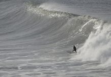 Warnings go out as big waves roll in
