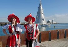 Crowds take a shine to floating tree as festive season kicks off